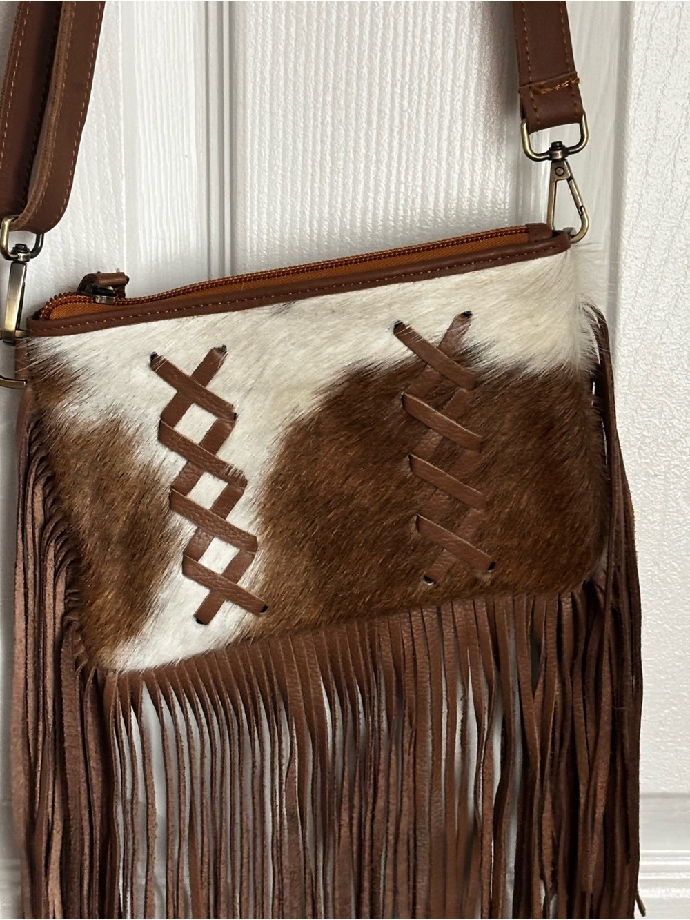 Brand New Western Linens Cowhide and
Fringe Crossbody